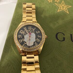 Gold Betsy Johnson watch
